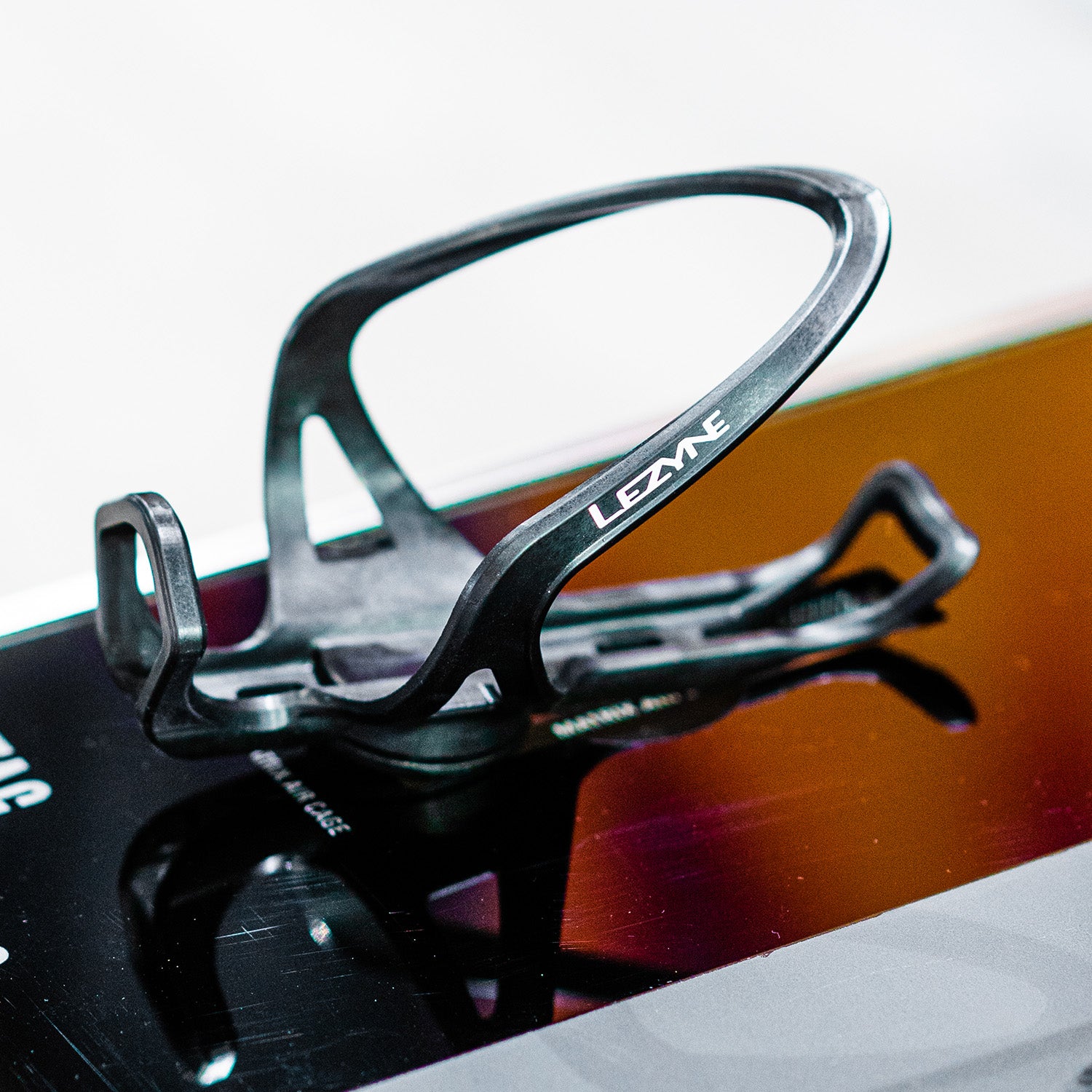 Lezyne Matrix Air Cage conceals an Apple Air Tagâ„¢ within the bottle cage.