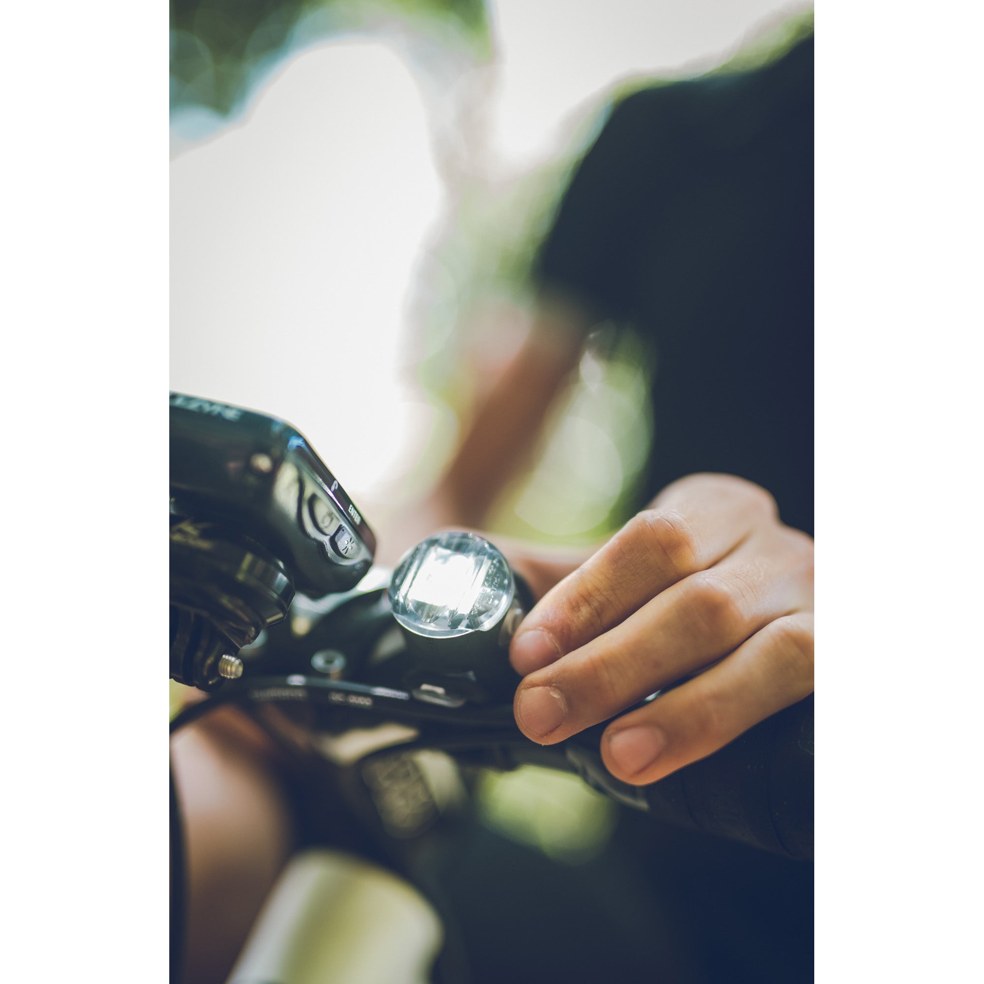 Black Femto USB Drive front bike light on a bike