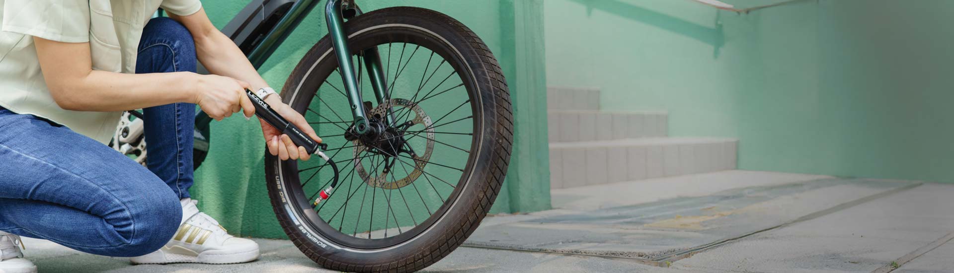 Close-up of Lezyne hand pump for e-bikes, designed for compact and reliable tire inflation to keep e-bike tires rolling.
