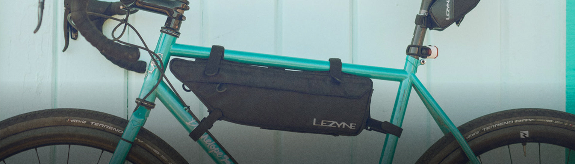 Several bags mounted to a bicycle.