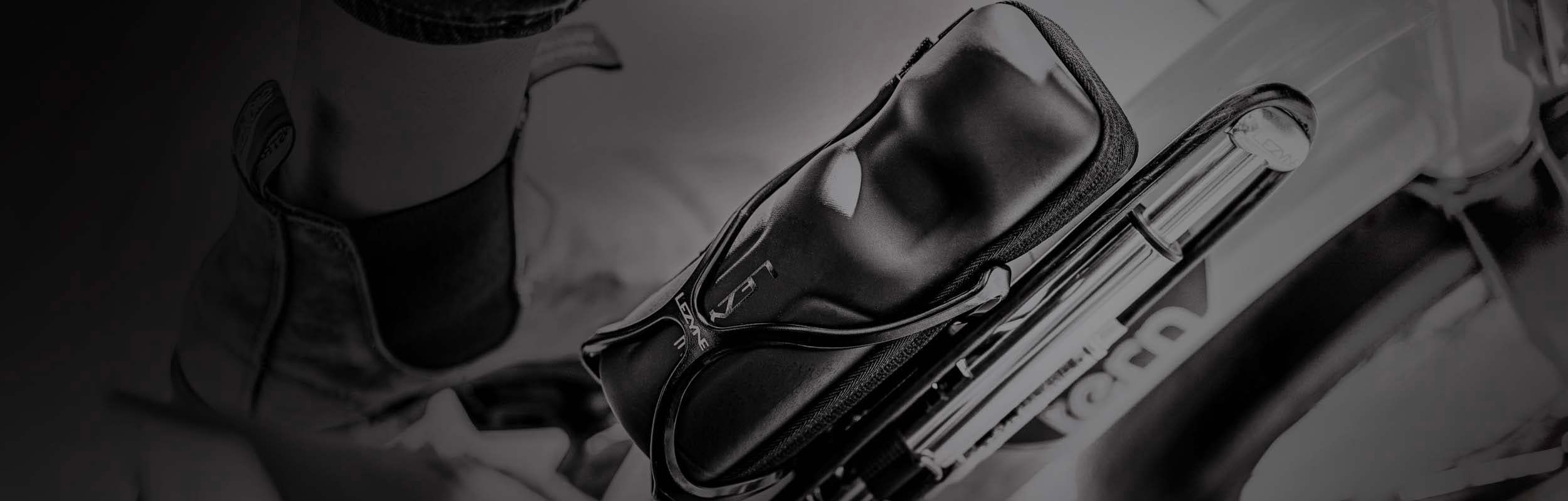 A bag and a pump mounted to a bottle cage.