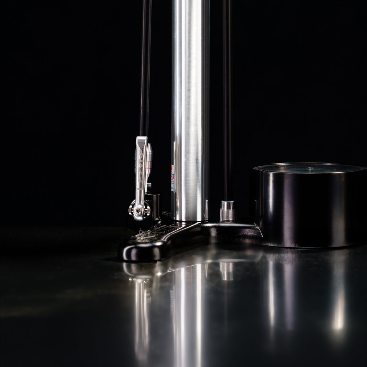 Close-up studio shot of the Lezyne Alloy Floor Drive 3.5 aluminum base and stable floor pump design