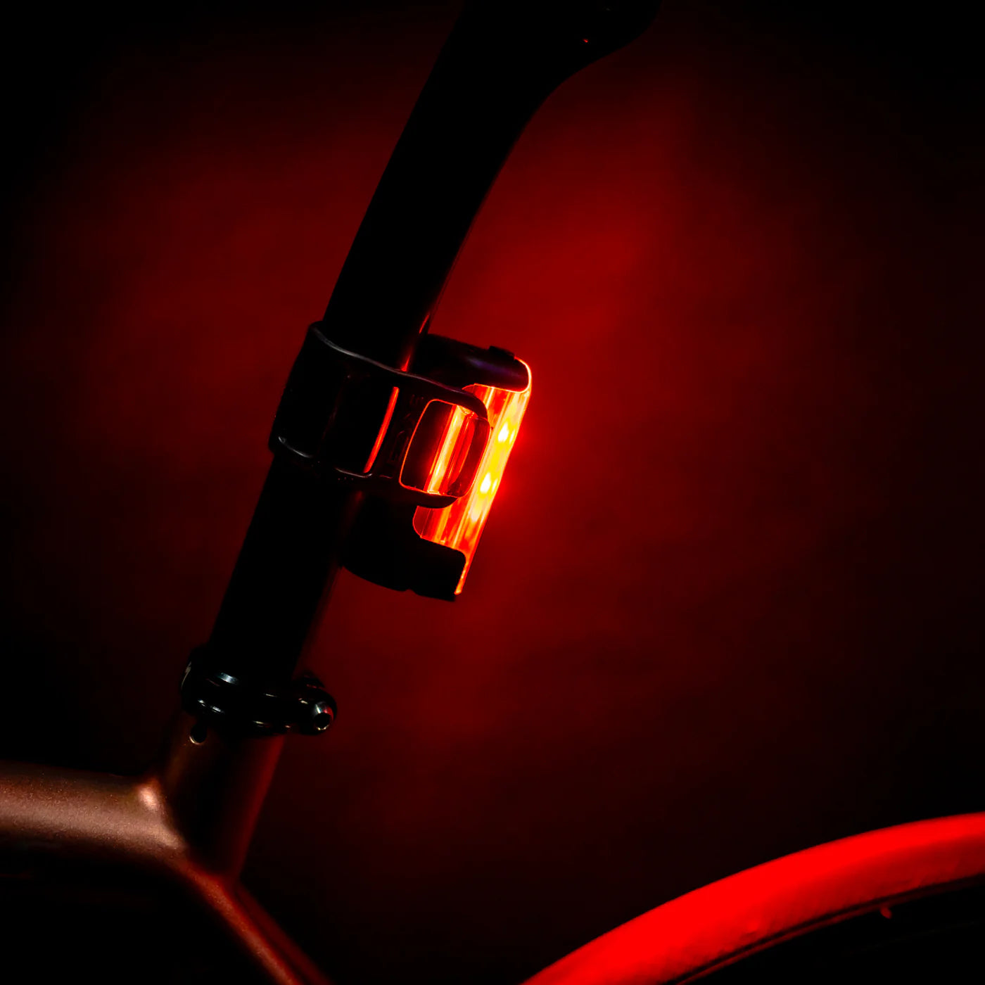 Strip Drive Pro 400+ Rear Light illuminated on a road bike