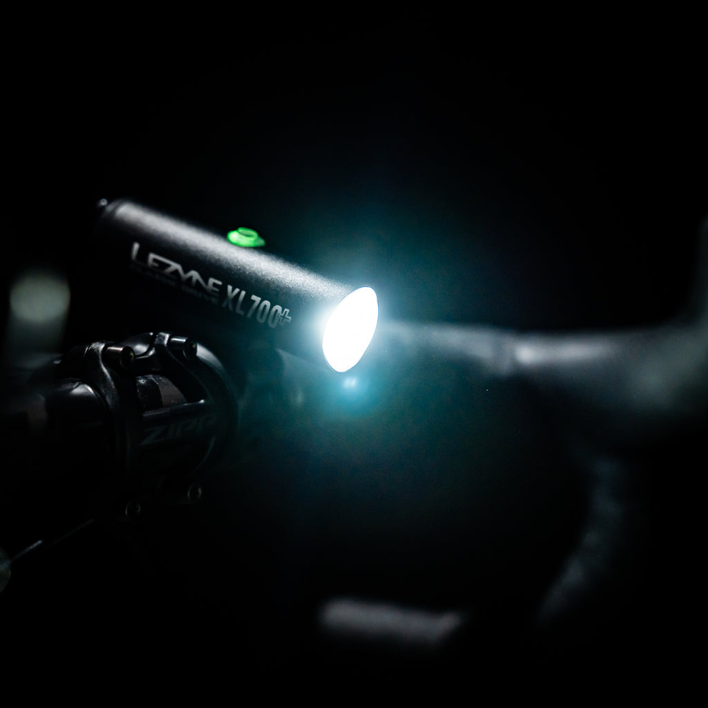 CLASSIC DRIVE XL 700+ LED front bike light mounted on gravel bike handlebars, 700 lumens, Daytime Flash mode, IPX7 waterproof.
