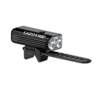 Profile view of a road bike featuring MACRO DRIVE 1400+ LED front light and bright rear bike light, the perfect combo for maximum safety for night cycling.