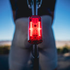 Close-up of the Radar Pro 300 active in 300-lumen Day Flash mode on a bicycle seatpost, delivering outstanding daytime visibility.