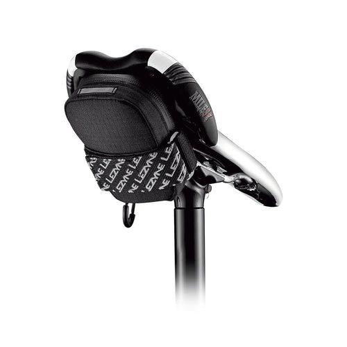 Compact Lezyne Road Caddy saddle bag featuring a water-resistant zipper and reflective accents for enhanced nighttime visibility.