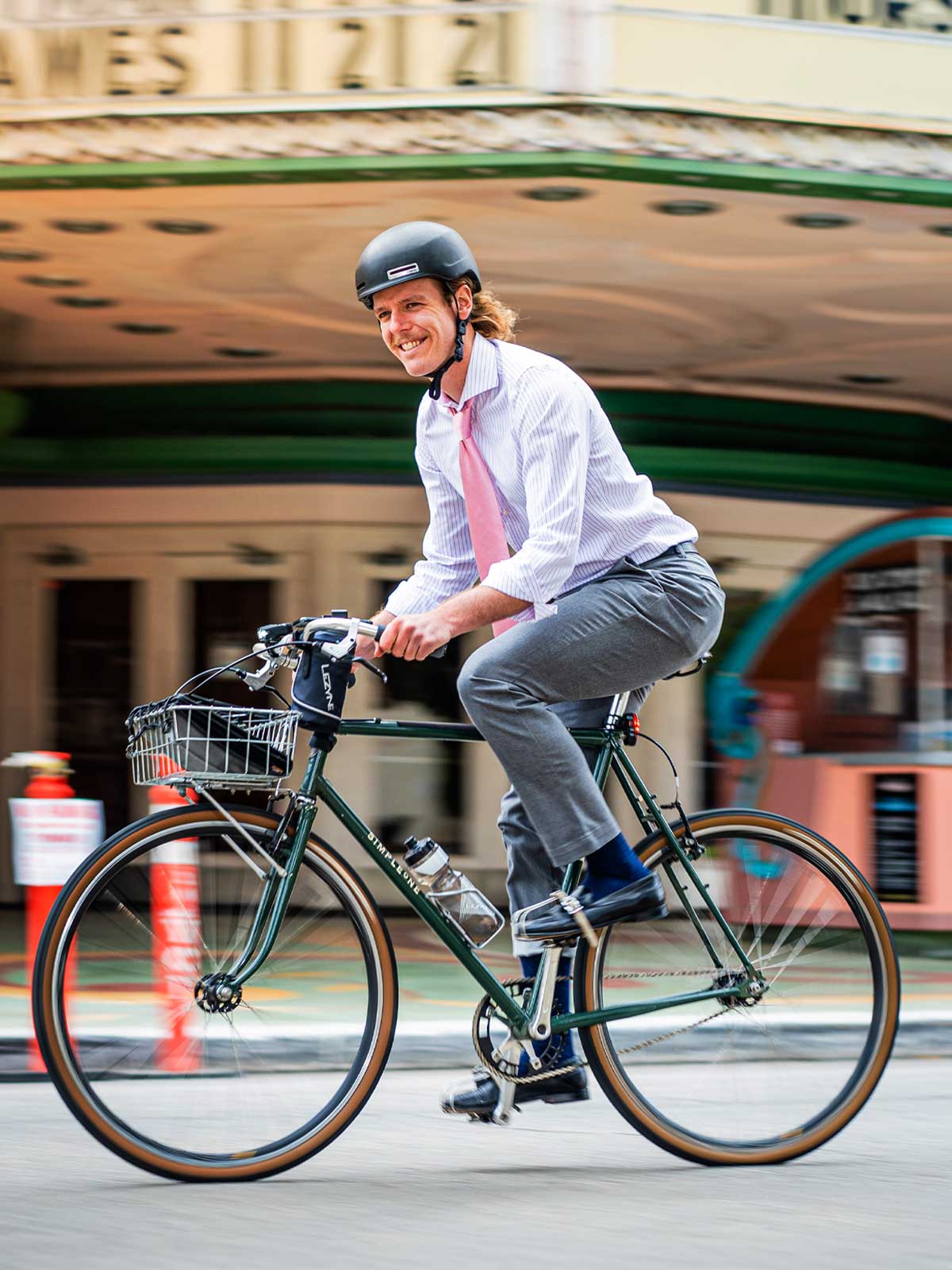 Commuter riding through town