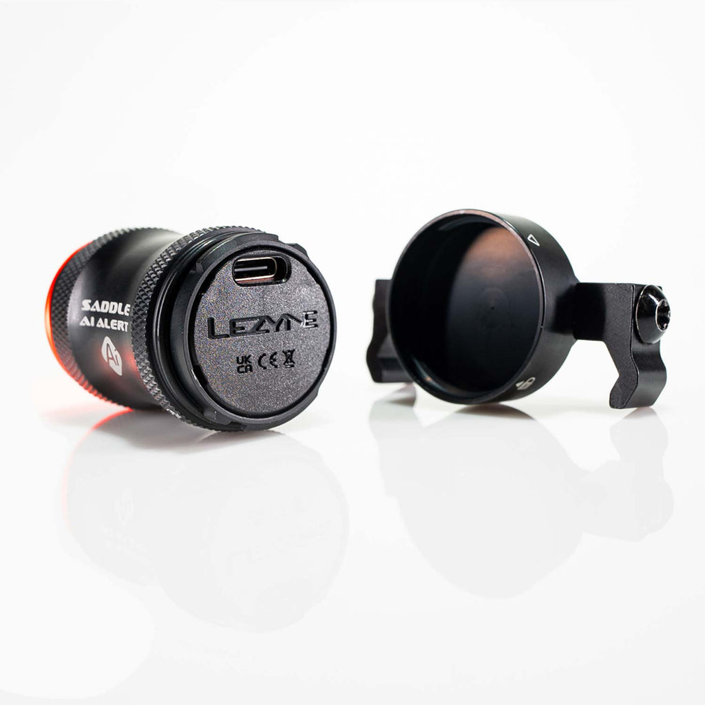 Back view of SADDLE Ai ALERT 250: LED rear bike brake light featuring waterproof USB-C port and durable CNC aluminum construction.