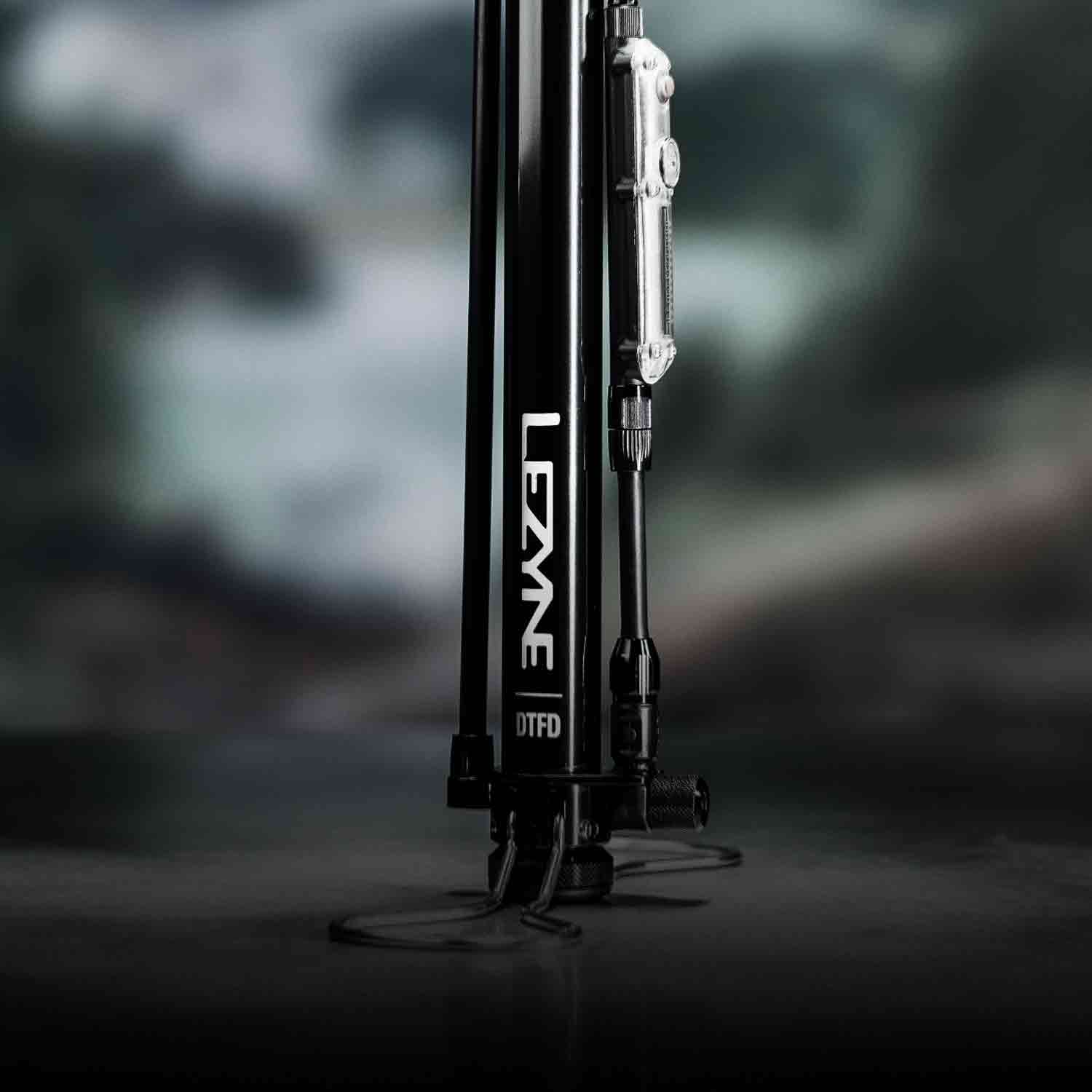 The base of a portable bicycle pump with the words Lezyne DTFD printed on it.