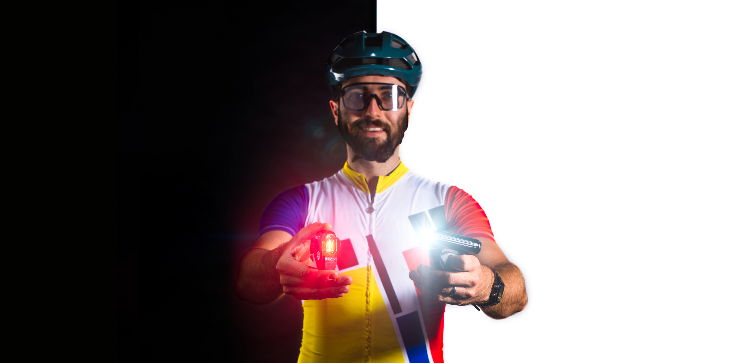 Road cyclist holding a front and rear light