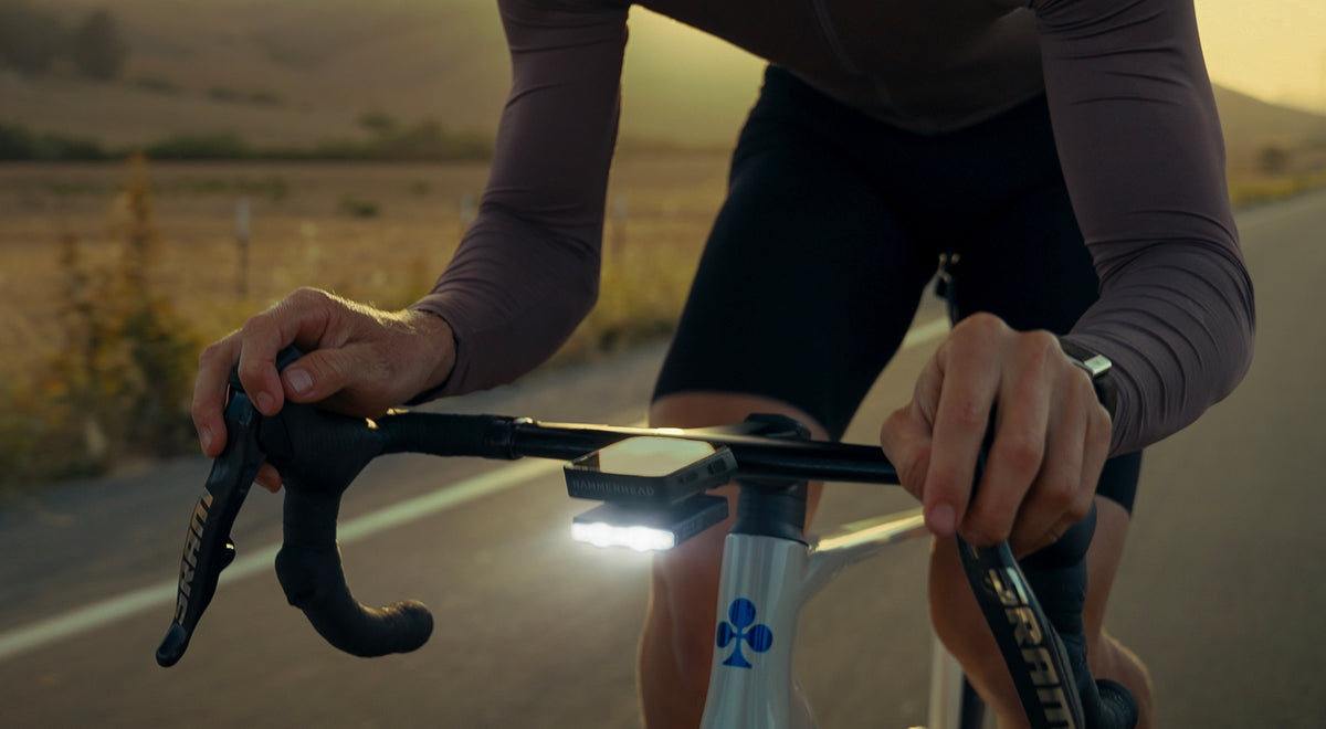 Lezyne Road Drive 500 in a cockpit of a road bike with a sunset background