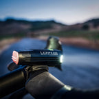 Lezyne React StVZO Front on remote road ride, warning riders with vehicle alerts when cars approach from behind.