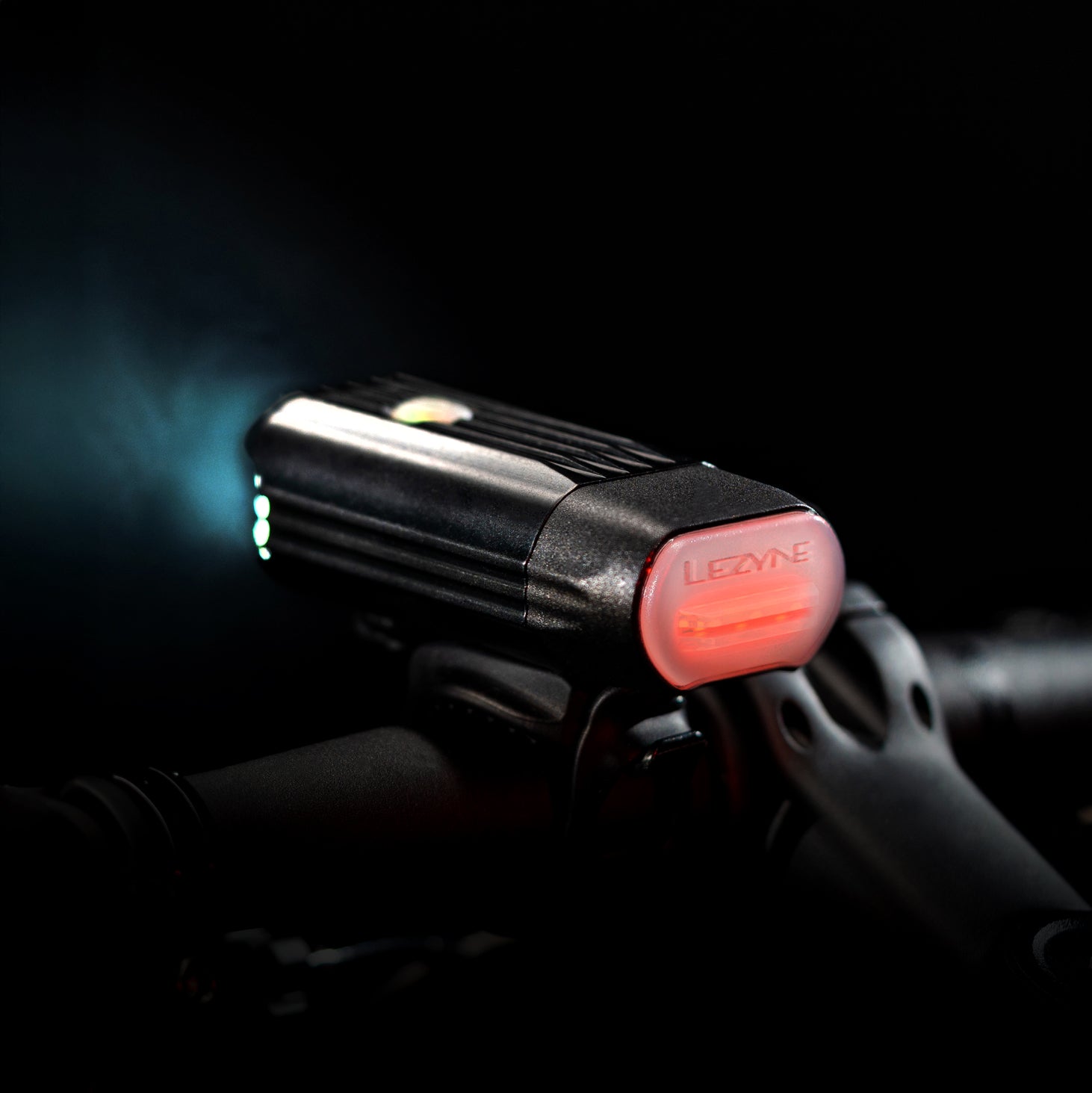 Lezyne React Drive LED front bike light rear studio shot. Alert light illuminating in red.