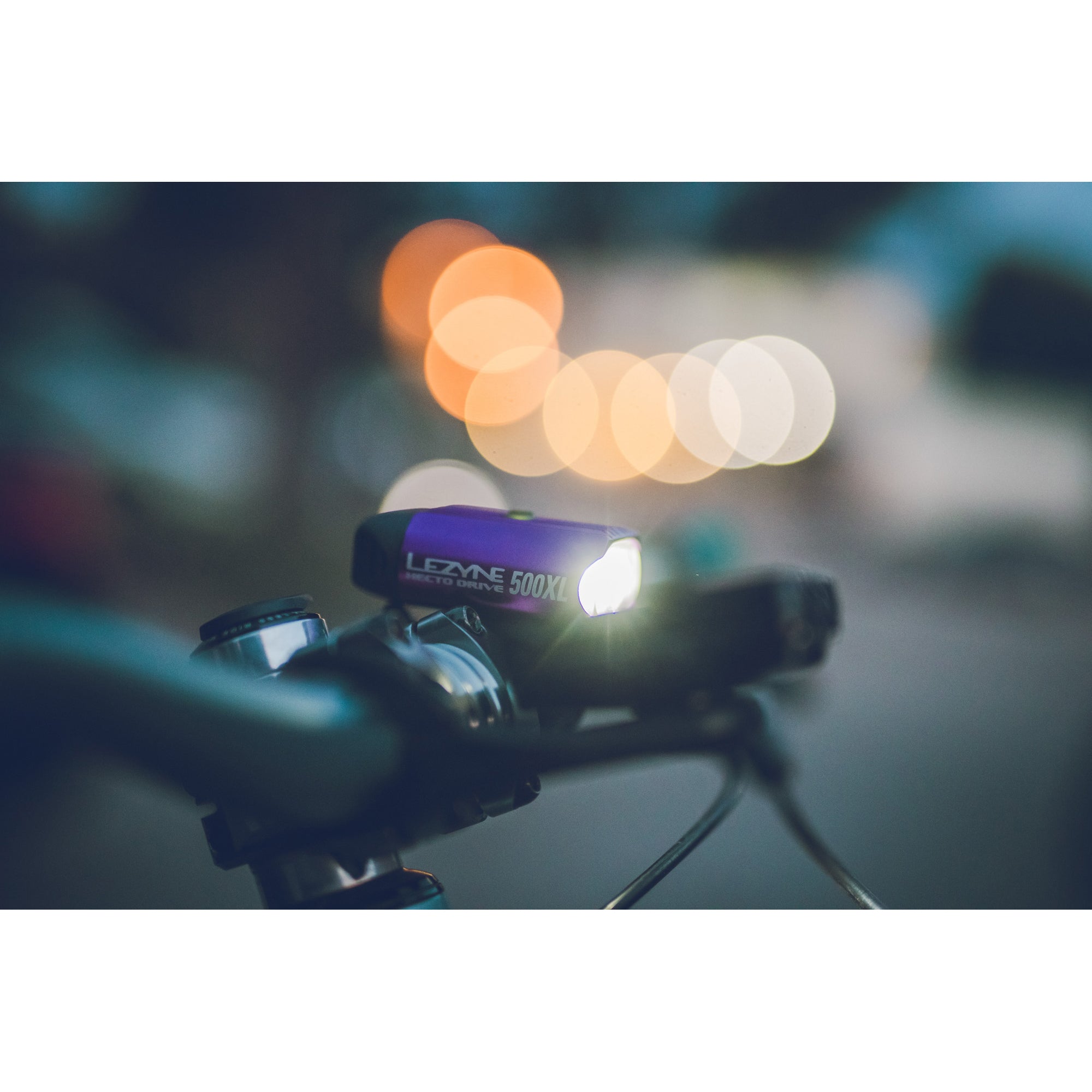 Purple Hecto Drive 500XL front bike light on a bike